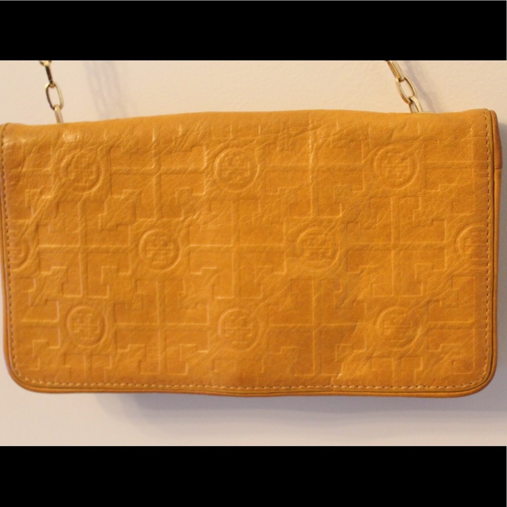 Yellow Tory Burch double sided wallet with gold chain
